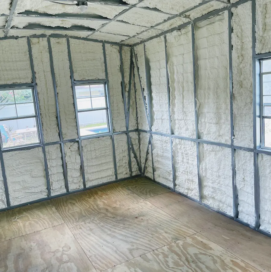 Closed-cell spray foam insulation applied to wall cavities in a residential project in Denton